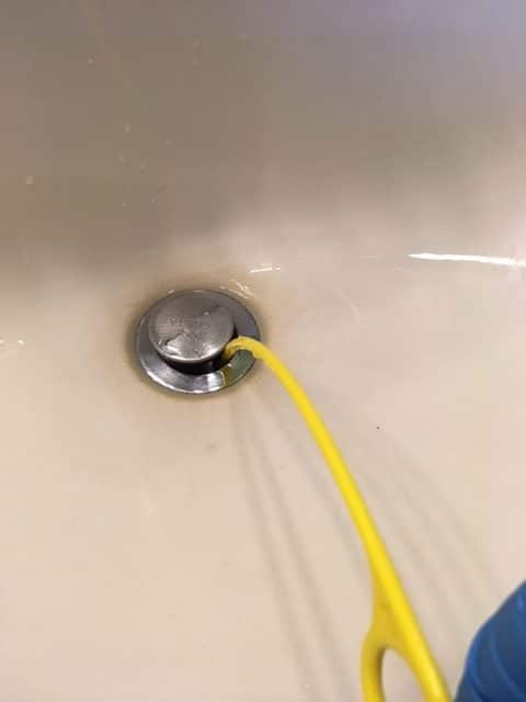 How To Remove Hair From The Drain With A Hanger 