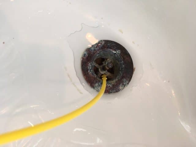 Snaked my bathtub drain and this ring of plastic came out with the hair  clog. Anyone know what this is? I'm worried I dislodged something that will  cause a leak. : r/Plumbing