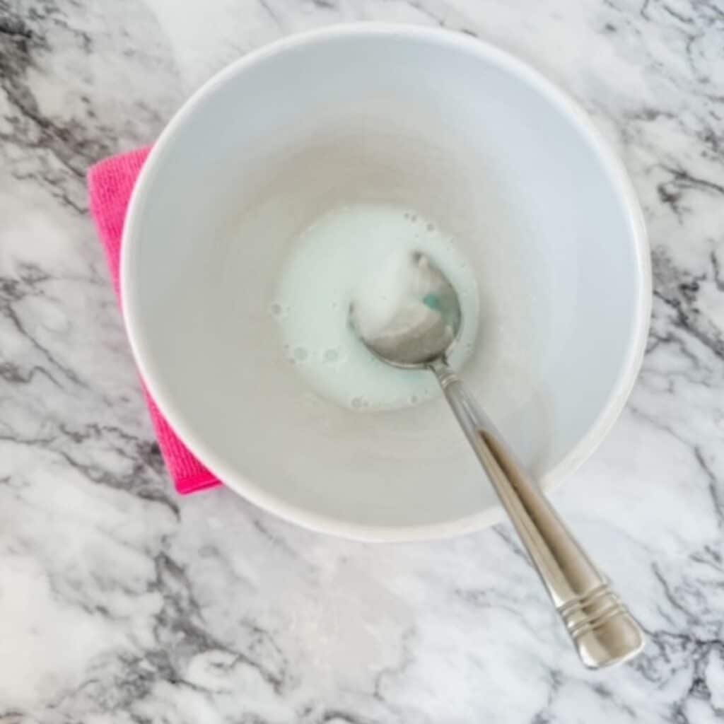 dawn, baking soda, and hydrogen peroxide in a bowl